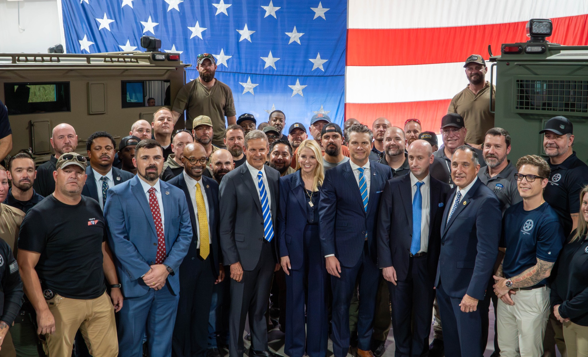 Department of Justice leadership and law enforcement group portrait