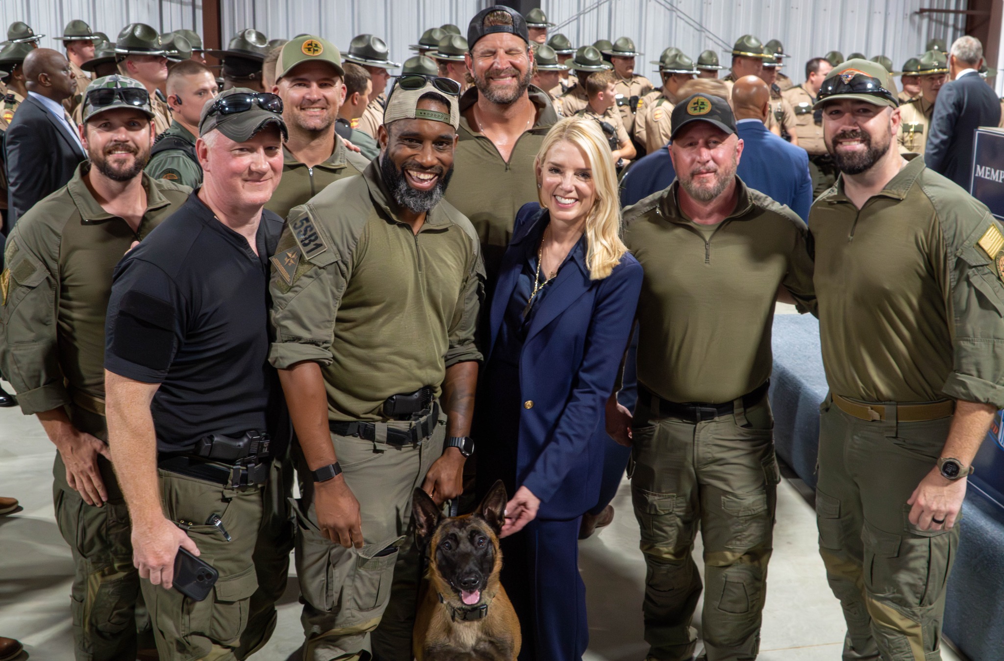Large group portrait with federal law enforcement personnel